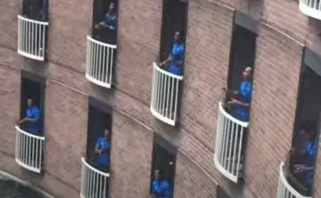 Equipa de rugby das ilhas Fiji em quarentena canta nas varandas de hotel